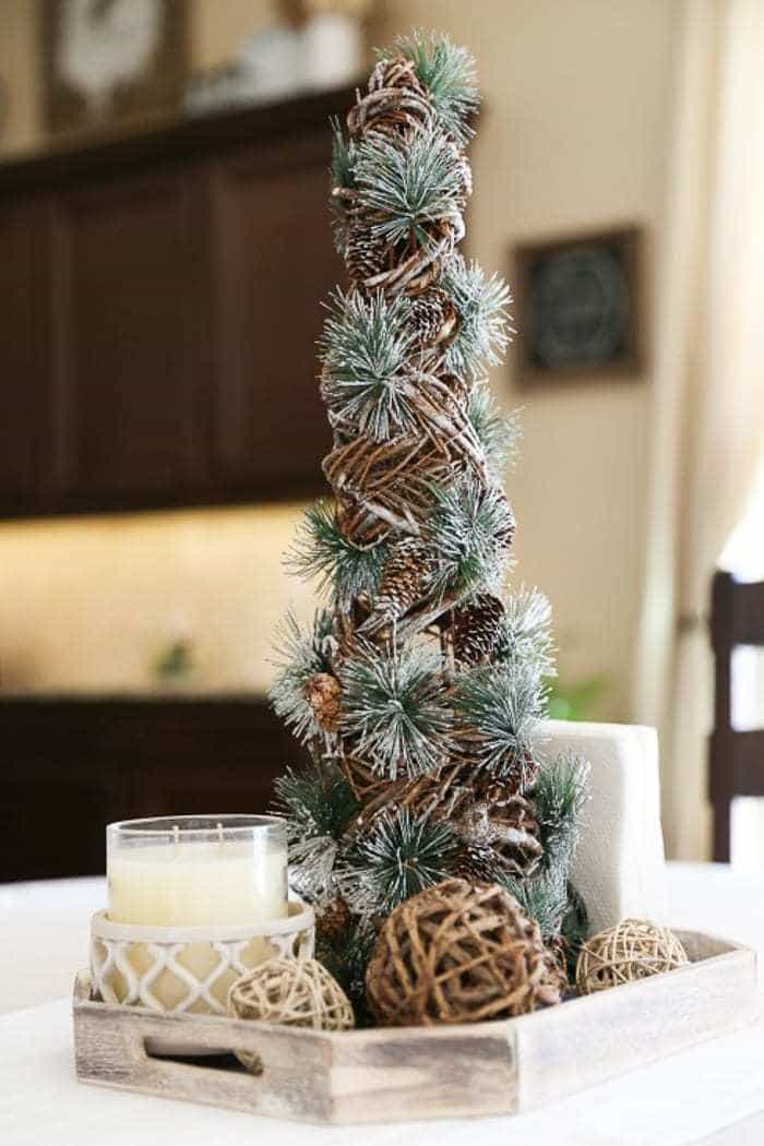 Add farmhouse charm with this DIY galvanized bucket to hold your Christmas tree.