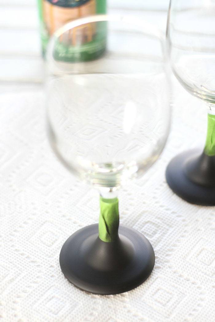 DIY tutorial to make your own chalkboard wine glasses! Add a personal touch and never lose your glass at a party again!