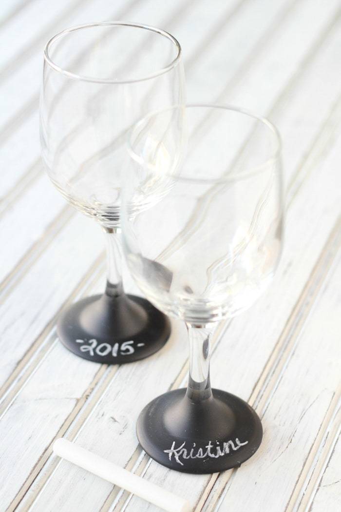 DIY tutorial to make your own chalkboard wine glasses! Add a personal touch and never lose your glass at a party again!