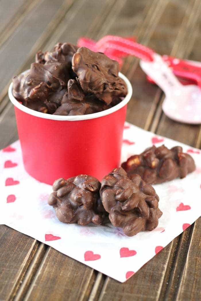 Homemade chocolate peanut clusters! A perfect treat for Valentine's Day or any day! They're sweet and savory!
