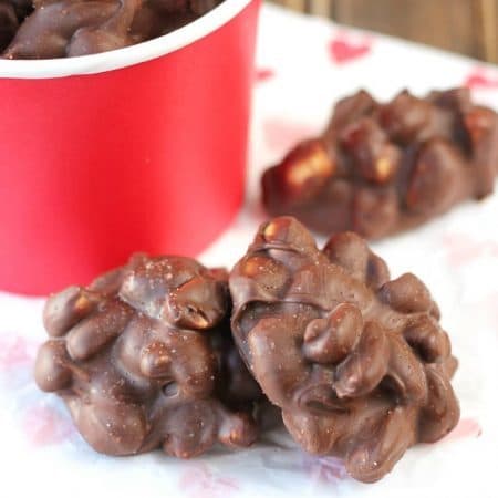 Homemade chocolate peanut clusters! A perfect treat for Valentine's Day or any day! They're sweet and savory!