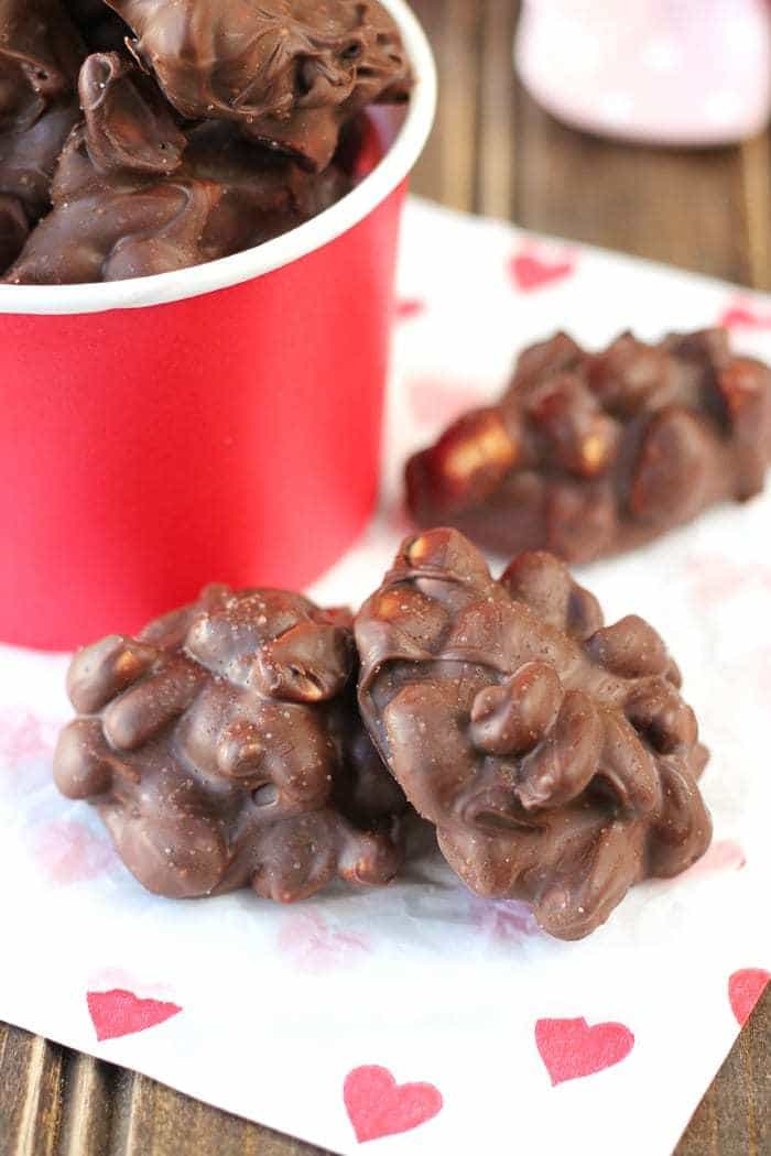 Homemade chocolate peanut clusters! A perfect treat for Valentine's Day or any day! They're sweet and savory!