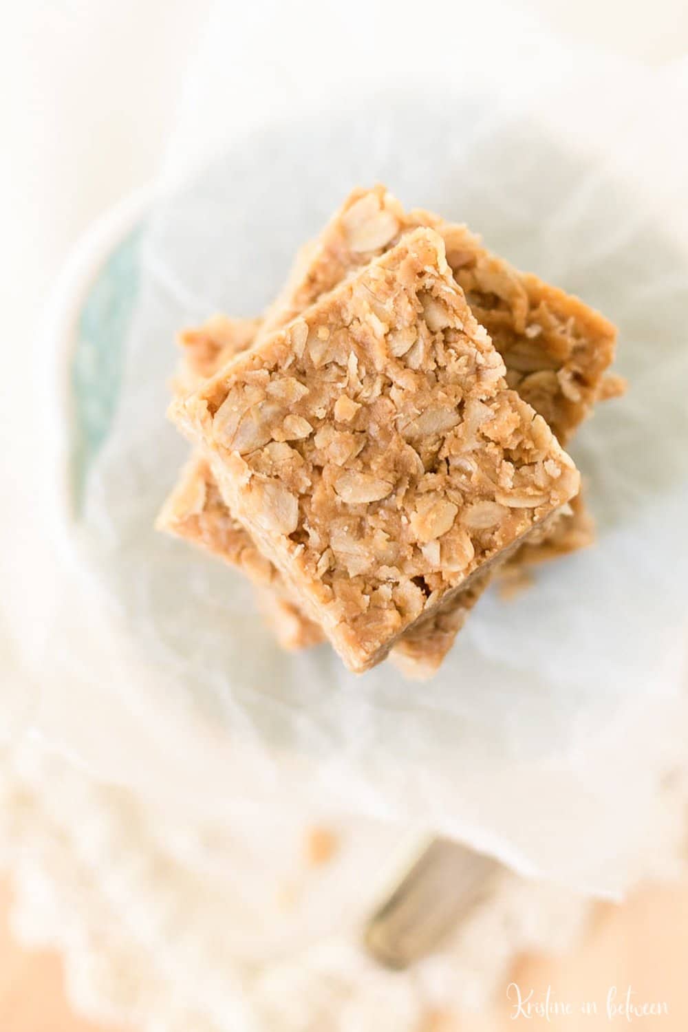 Four ingredient peanut butter oat bars made with real food ingredients and no refined sugar! They are a perfect snack!