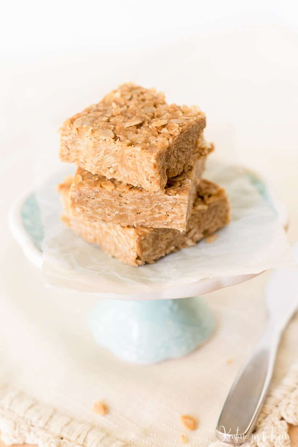 Four ingredient peanut butter oat bars made with real food ingredients and no refined sugar! They are a perfect snack!