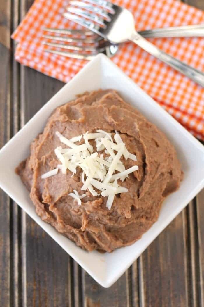 Homemade refried style beans in the Crock-Pot! Now you can enjoy a healthier alternative to canned refried beans!