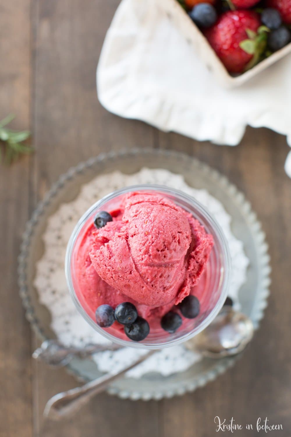 You'll love this easy no-churn raspberry frozen yogurt! It's made with only three ingredients! Perfect for hot summer days!
