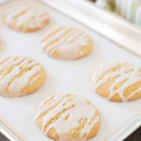 You'll love these thin and chewy maple sugar cookies! They're soft, yet have crispy edges and are covered with a light maple glaze.