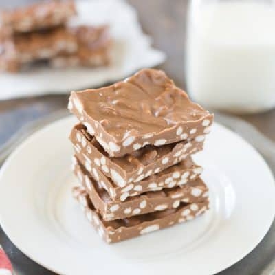 Simple three ingredient peanut butter chocolate crunch bars! These bars are low in sugar and high in protein.