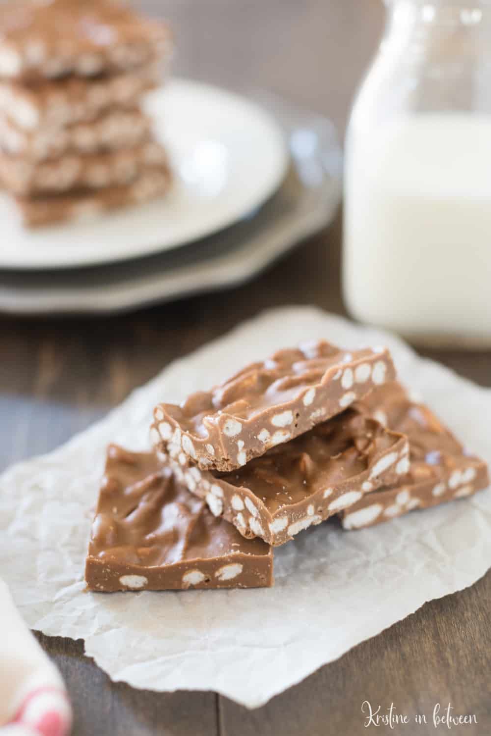 Simple three ingredient peanut butter chocolate crunch bars! These bars are low in sugar and high in protein.