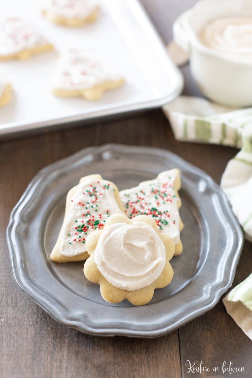 This is the best traditional sugar cookie recipe around! The cookies are light and flaky, perfect for topping with homemade buttercream frosting and sprinkles!