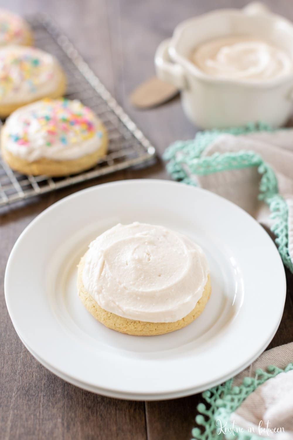 This soft sugar cookie recipe is a must-bake for the holidays! The cookies are light and fluffy, making them perfect for buttercream frosting and sprinkles!
