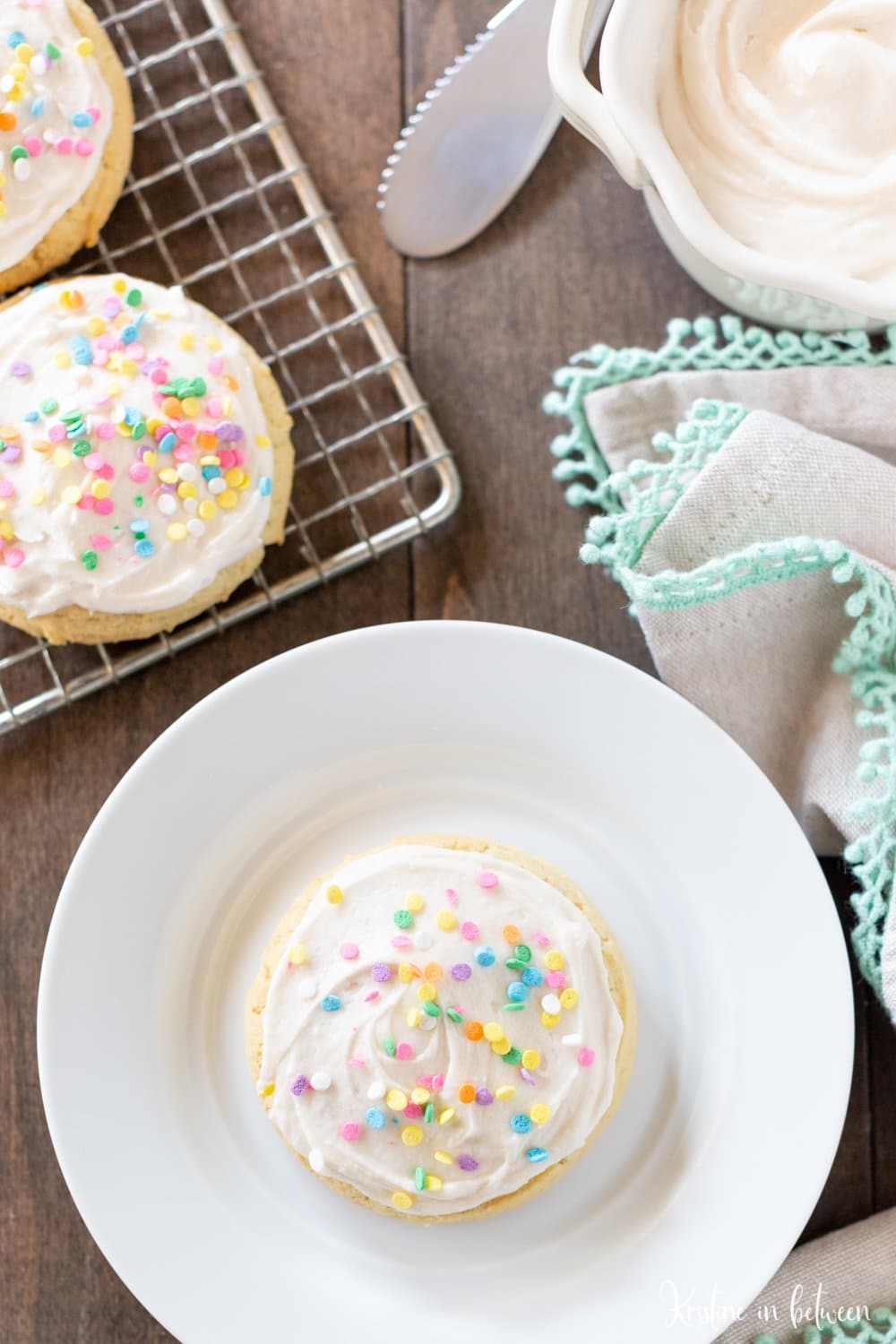 This soft sugar cookie recipe is a must-bake for the holidays! The cookies are light and fluffy, making them perfect for buttercream frosting and sprinkles!