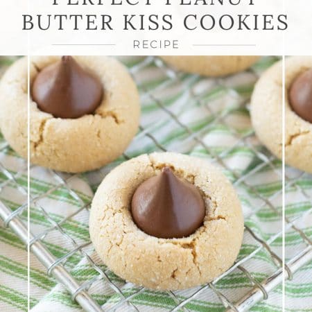 Peanut butter kiss cookies with a green striped napkin in the background