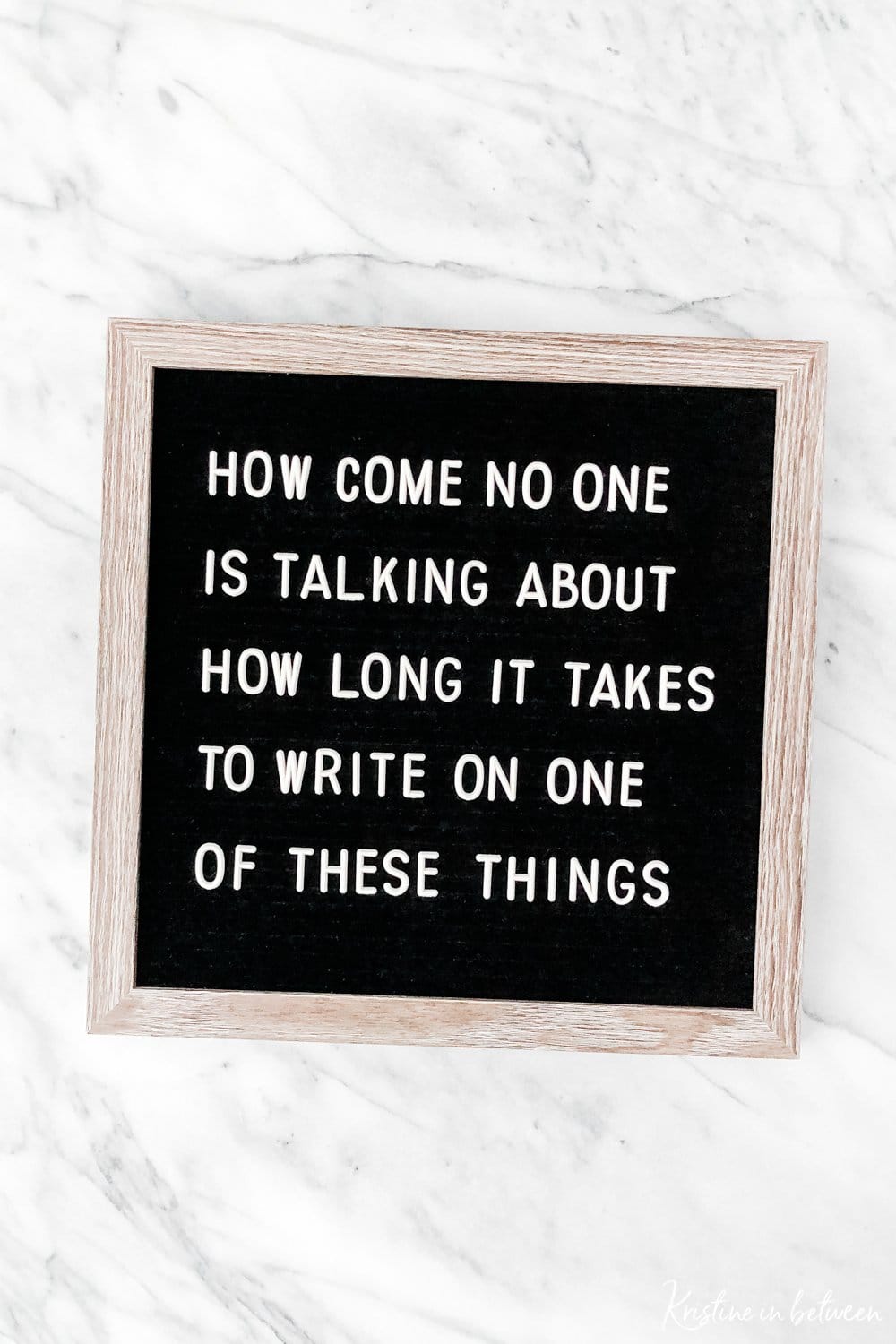 A letter board with writing on it.