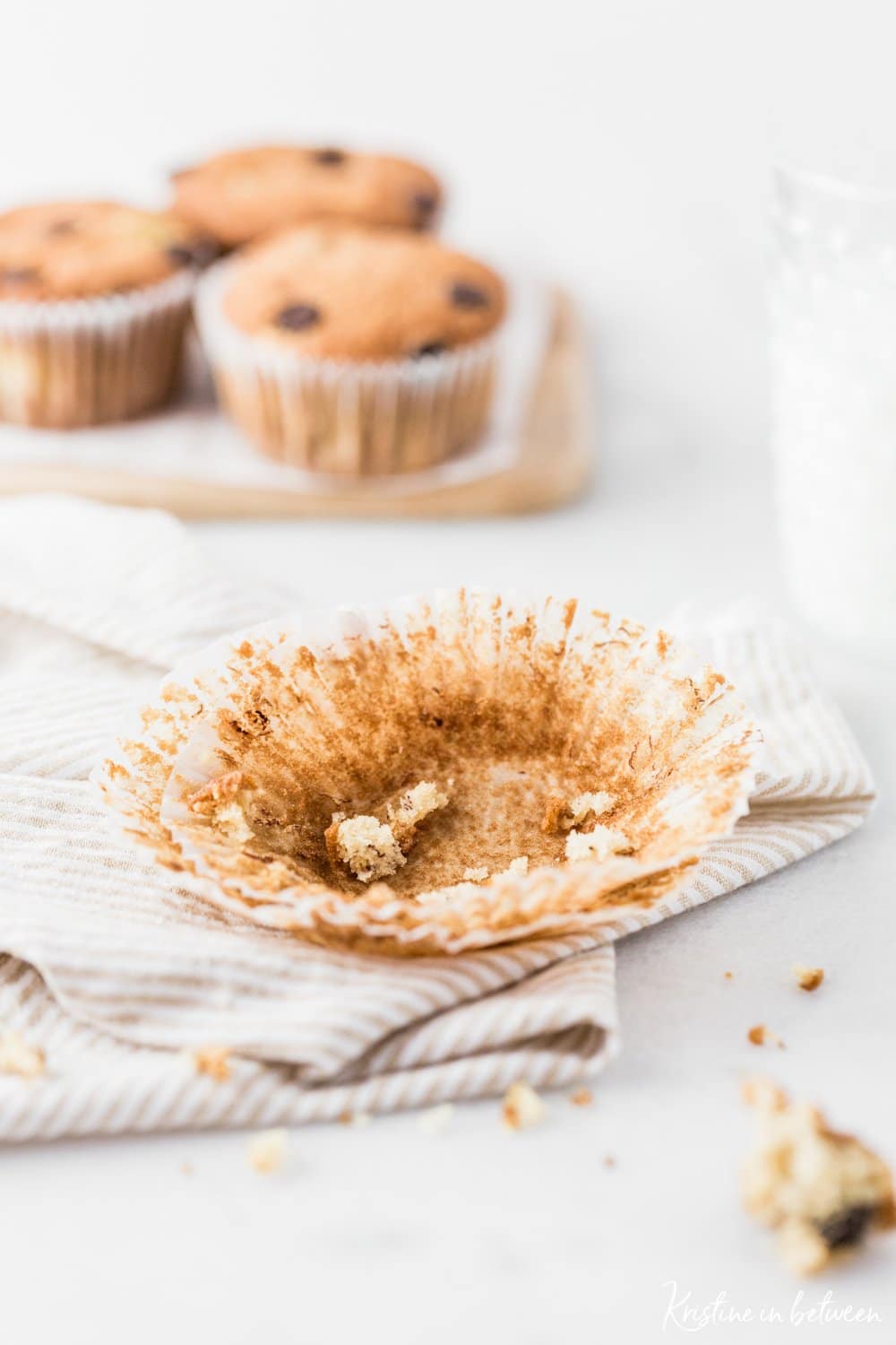 Super easy everyday chocolate chip banana bread muffins! They're light and fluffy and loaded with chocolate!