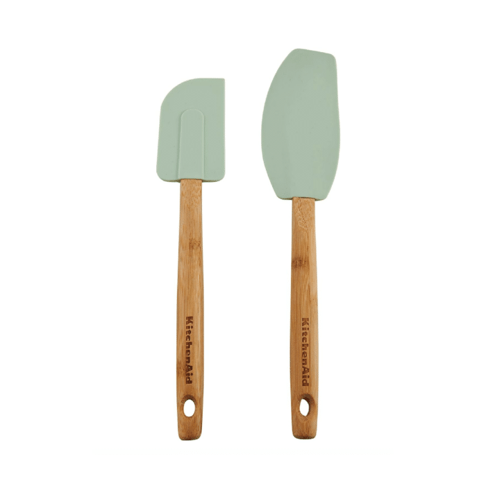 Two Kitchenaid rubber spatulas with bamboo handles.