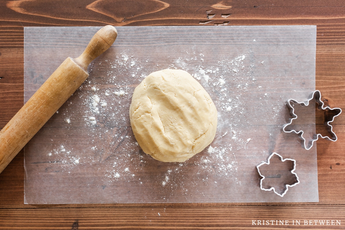 Process shots of making cut out sugar cookies.